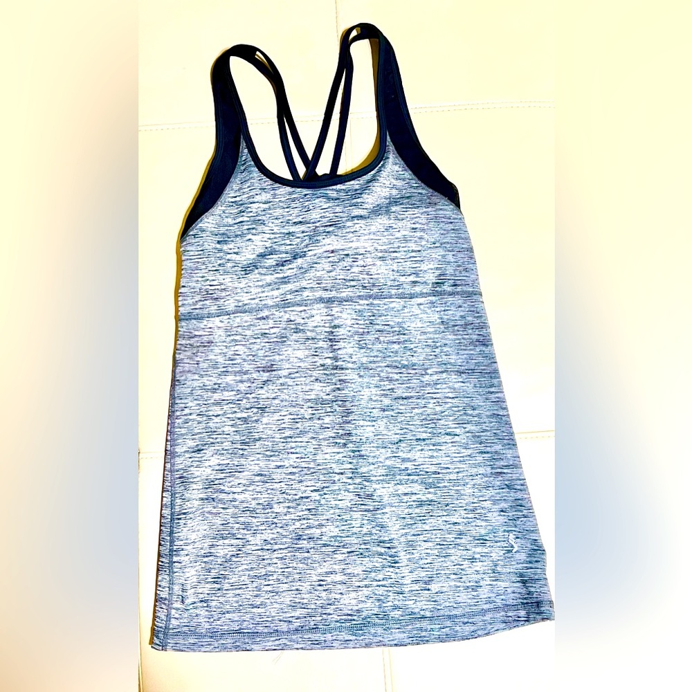 Women’s, workout tank top. Built-in bra. Very gently used.